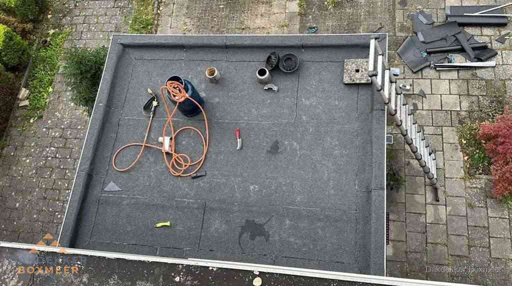 Plat dak met nieuwe bitumen bedekking in Boxmeer Plat dak met nieuwe bitumen bedekking in Boxmeer
